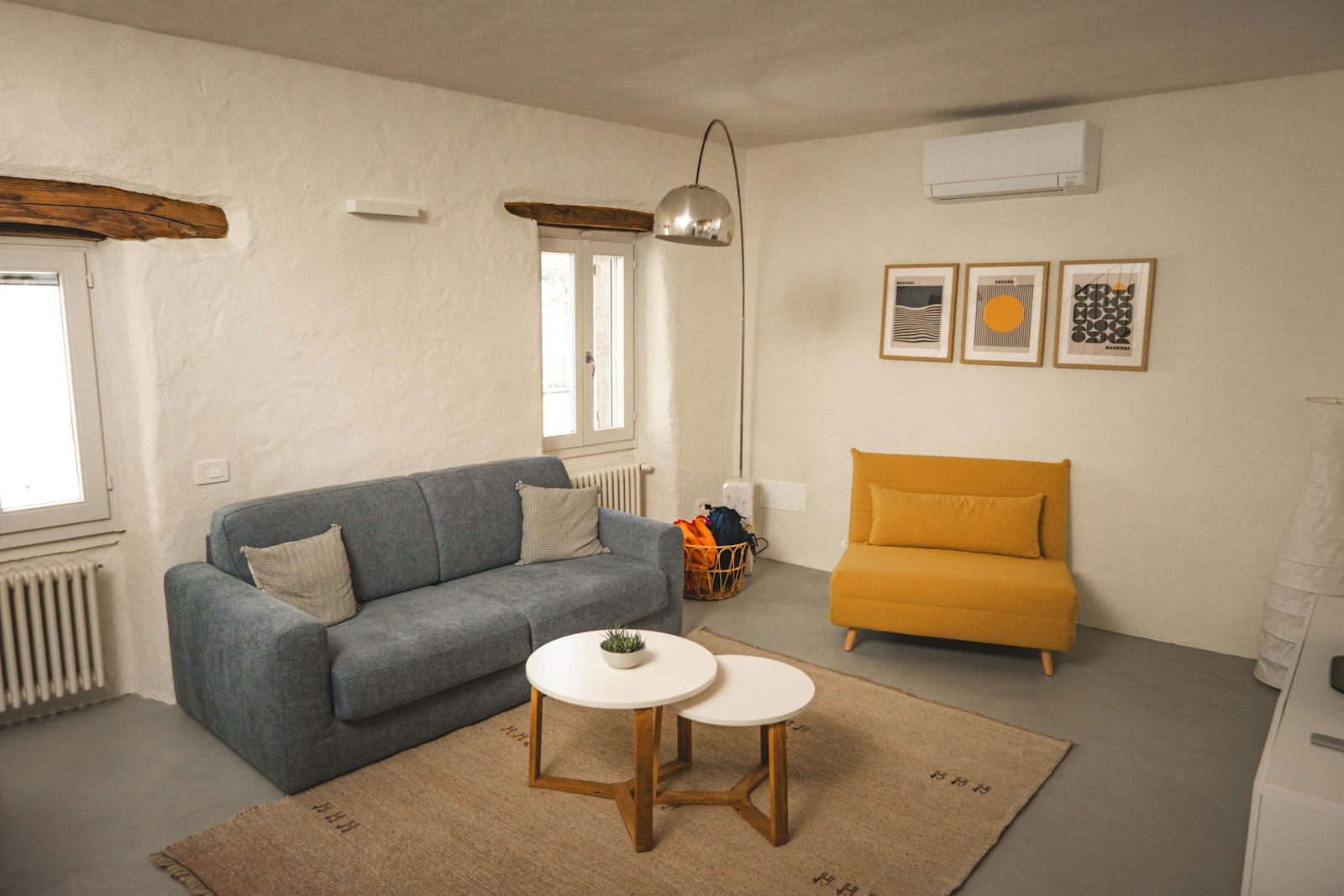 Bright modern Halifax living room featuring a clean wall-mounted mini-split heat pump